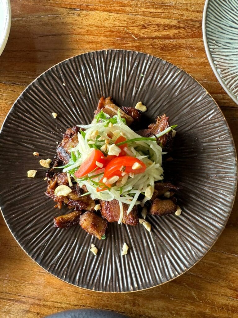 Crispy-Pork-Belly-with-Fresh-Salad-and-Crushed-Nuts-Garnish